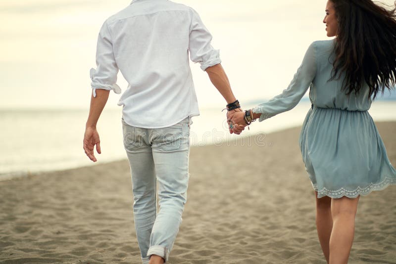 Young Lovers Walking the Beach Stock Photo Image of pleasure
