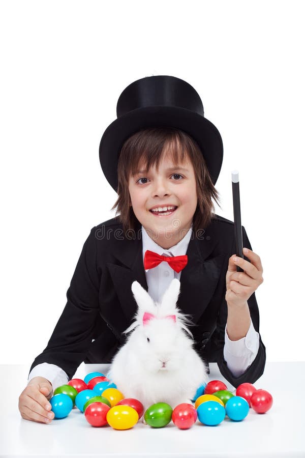 Young magician boy preparing for easter stock image Young magician boy preparing for easter stock image