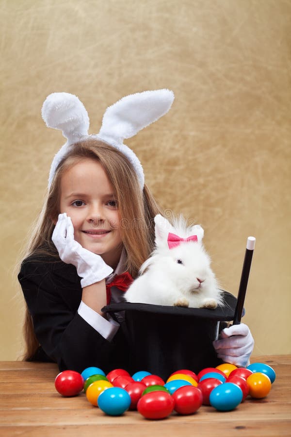 Young magician after successfully conjuring an easter rabbit stock photography Young magician after successfully conjuring an easter rabbit stock photography
