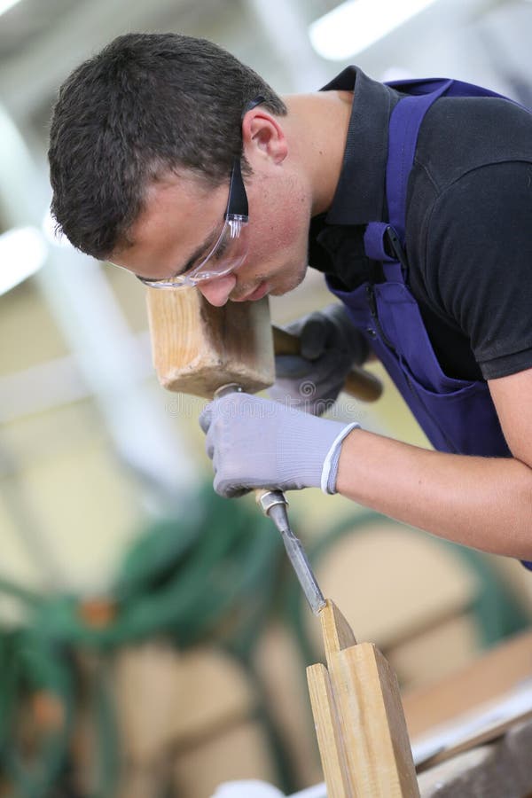 Young Male Apprentice Doing Carpentry Work Stock Image Image of