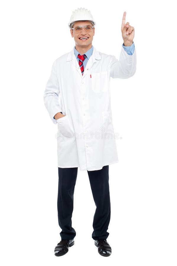 Young male architect pointing at copy space royalty free stock image