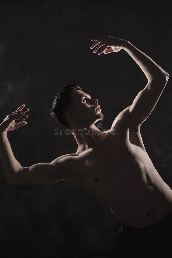 A Young Male Ballet Dancer with Black Leggings and a Naked Torso Performs  Dance Moves Against a Gray Grunge Background Stock Image - Image of  performance, motion: 138840517