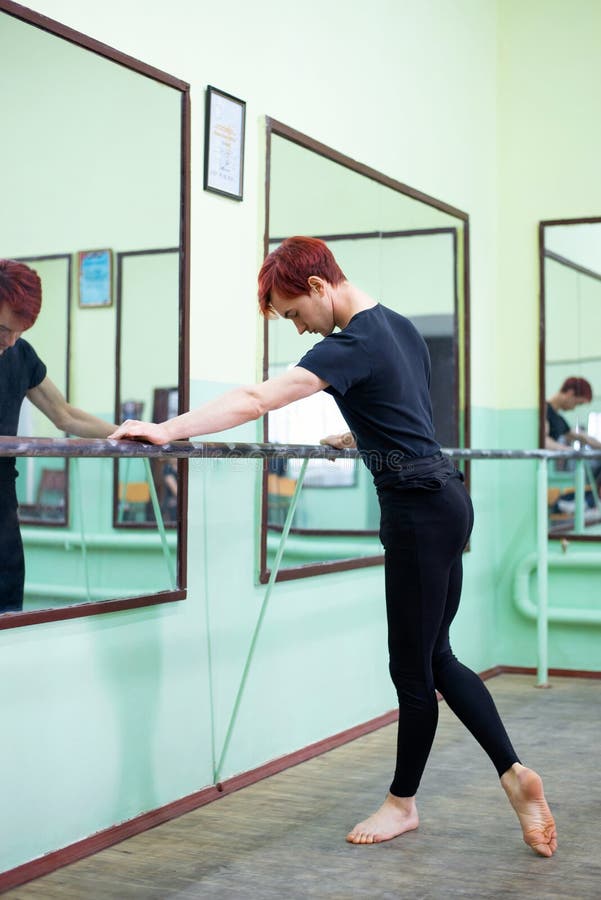 Young Male Dancer Practicing New Moves in Dancing Studio Stock Photo
