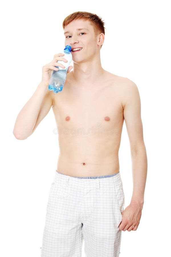 Young male drinking water , isolated on white background