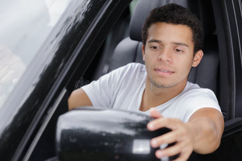 Young Male Driver Adjusting Wind Mirror on Car Stock Image - Image of ...