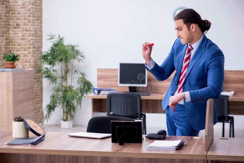 Young Male Employee Playing Darts in the Office Stock Image Image of
