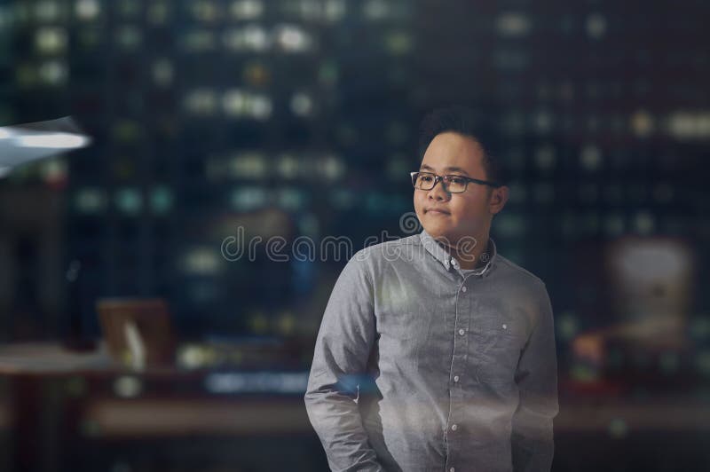 Young male model with eye glasses looking at something. stock photo Young male model with eye glasses looking at something. stock photo