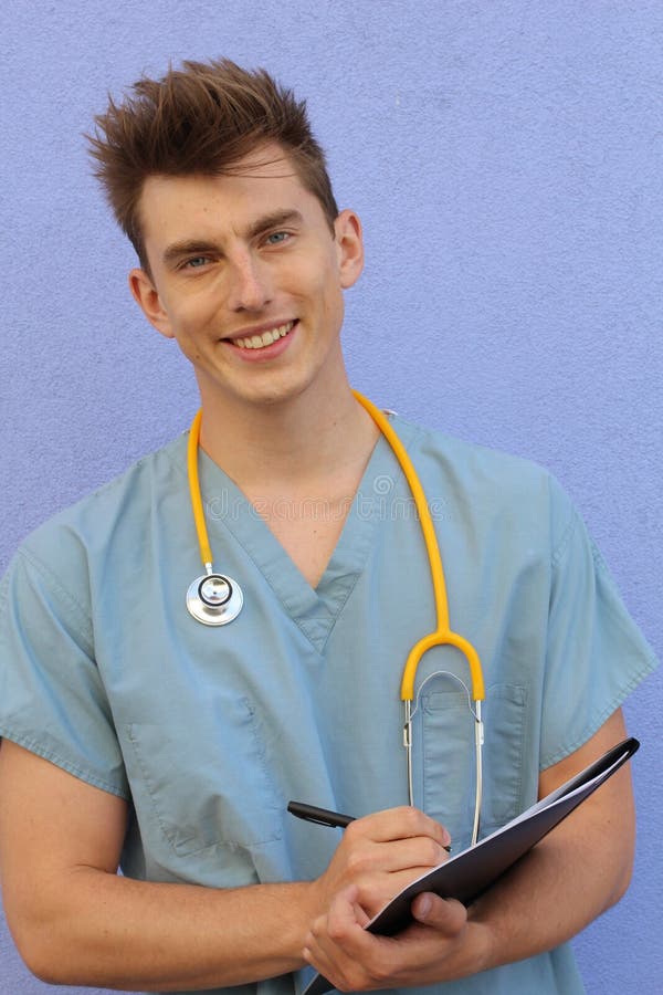 Young male nurse with a clipboard royalty free stock photos Young male nurse with a clipboard royalty free stock photos