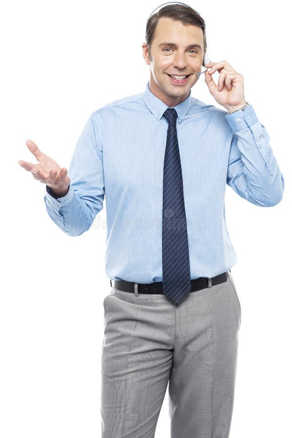 Young male operator speaking to customer royalty free stock photo