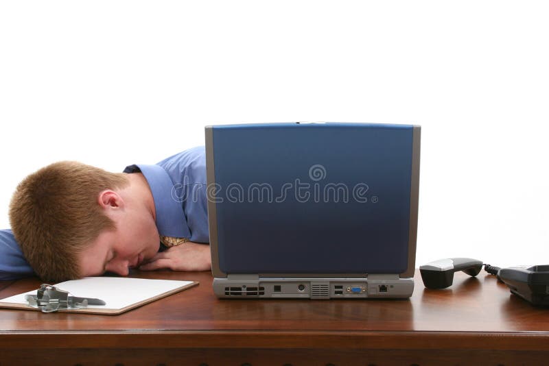 Young Man Asleep at Desk