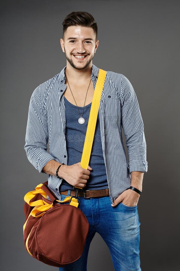 Young man with bag stock photo. Image of gray, smile 46355360
