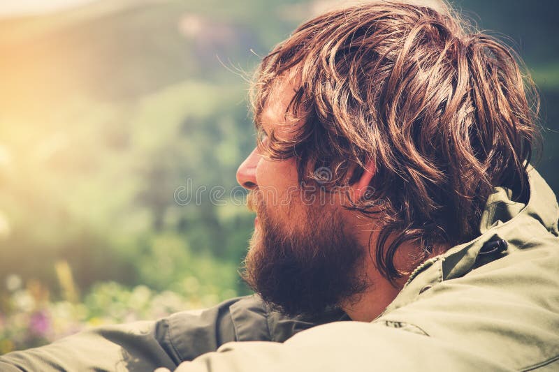 Young Man bearded relaxing alone outdoor