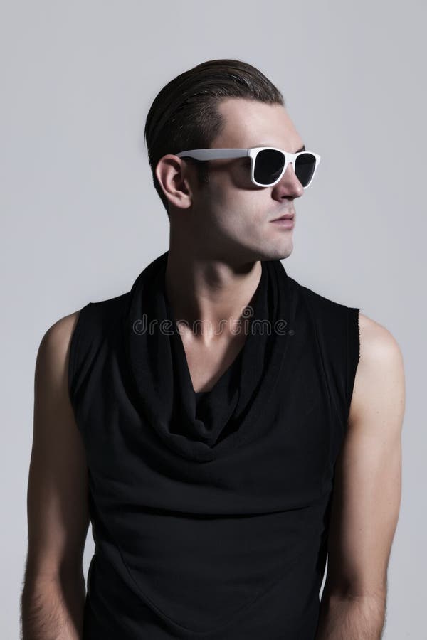 Young man with black shirt and sunglasses