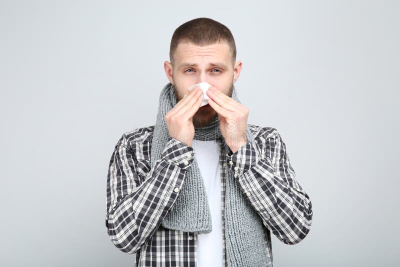 Man Blowing Nose in Handkerchief Stock Image Image of medicine
