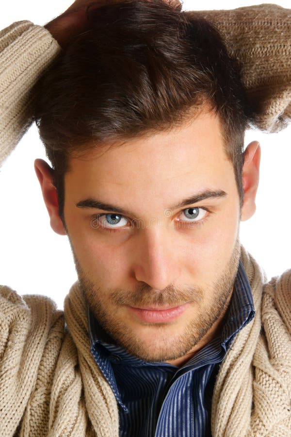 Portrait Of A Nice Young Attractive Man With Blue Eyes Stock Photo