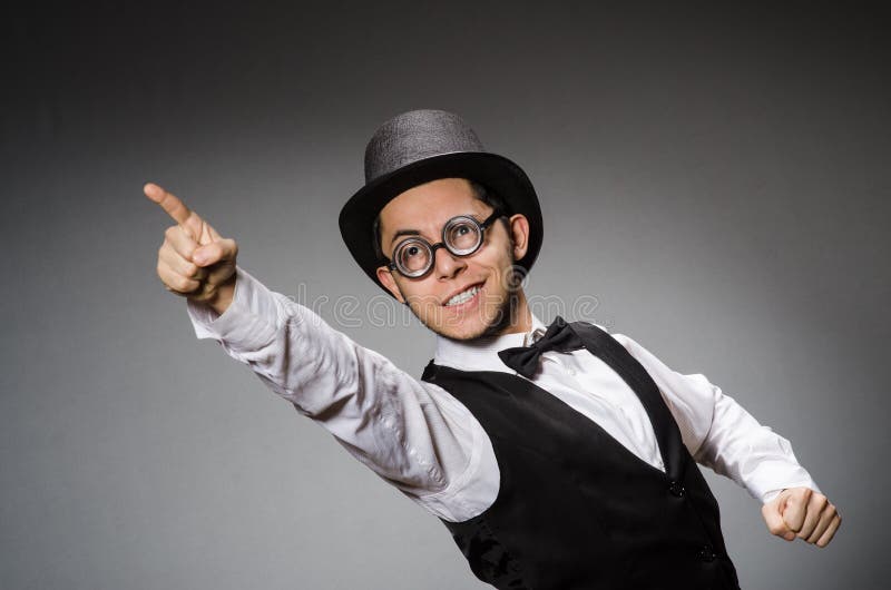 The young man in classical black vest and hat stock photos