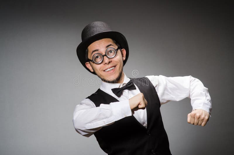 The young man in classical black vest and hat stock photos