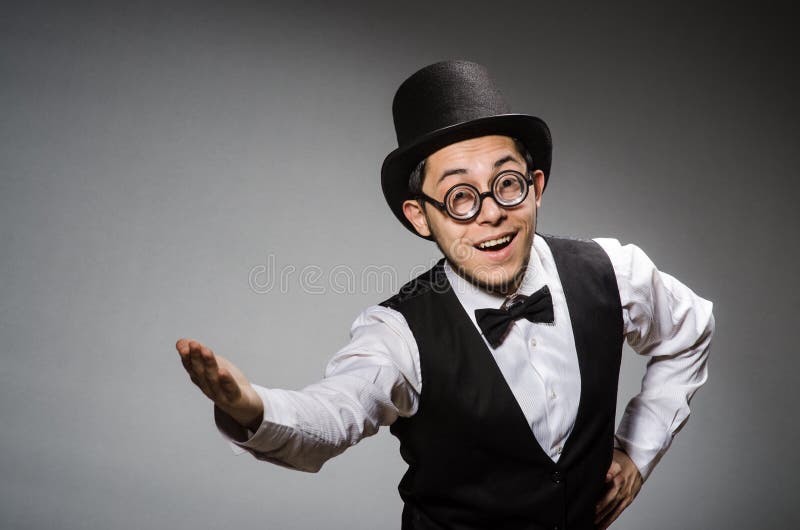 The young man in classical black vest and hat stock photo
