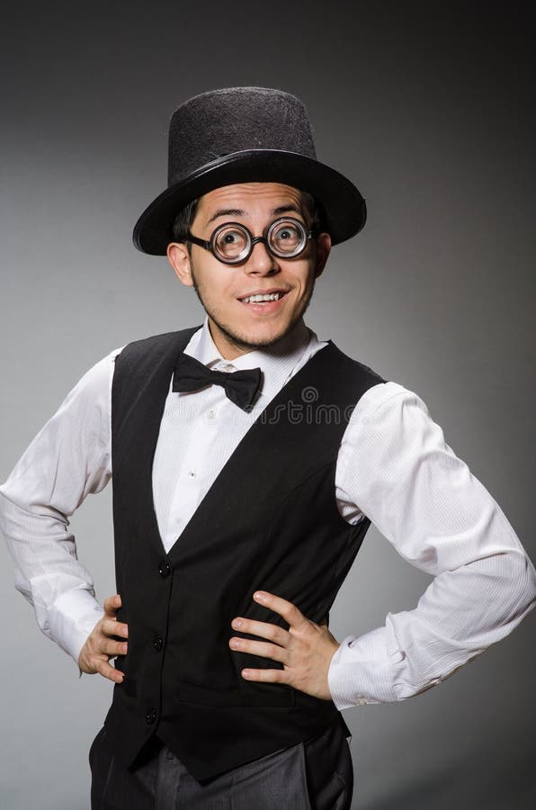 The young man in classical black vest and hat stock photos