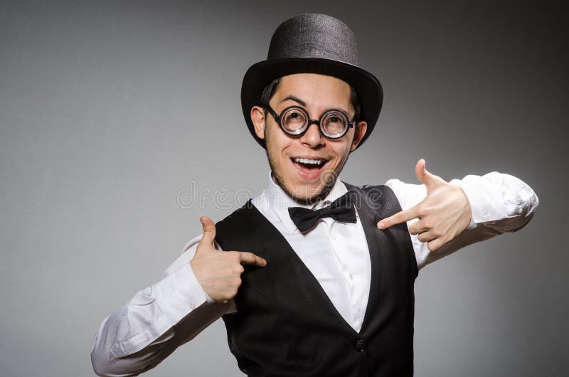 The young man in classical black vest and hat stock photo