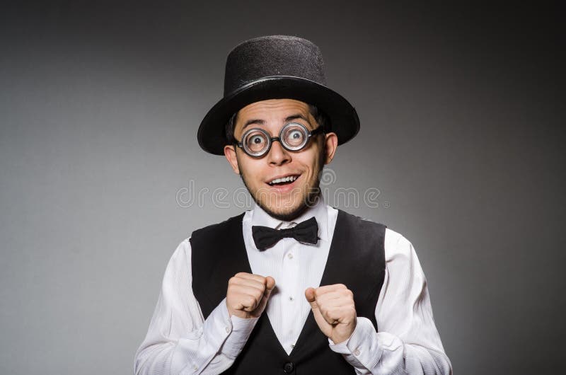 The young man in classical black vest and hat royalty free stock images
