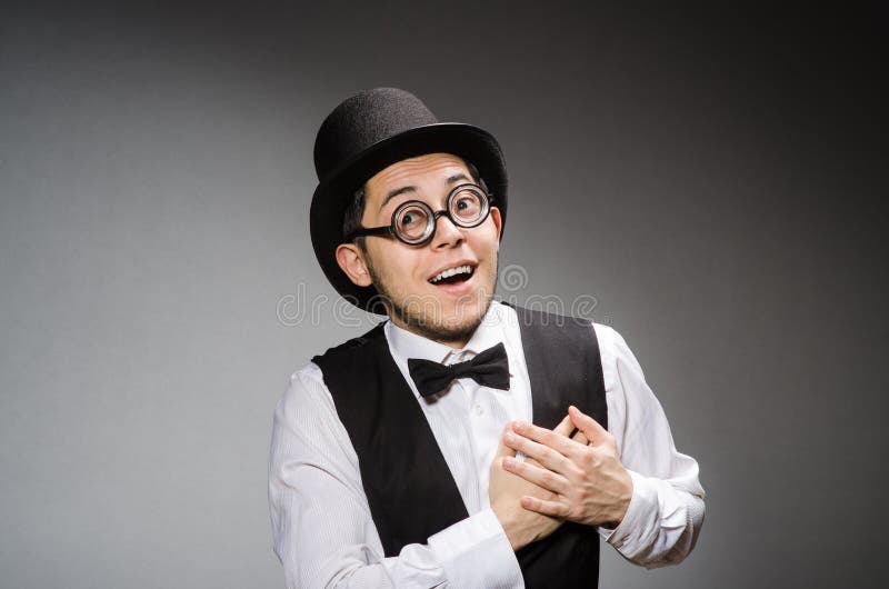 The young man in classical black vest and hat royalty free stock photos