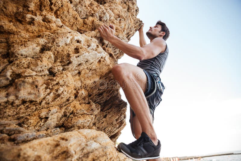 Young Man Climbing Natural Rocky Wall Stock Photo Image of adult