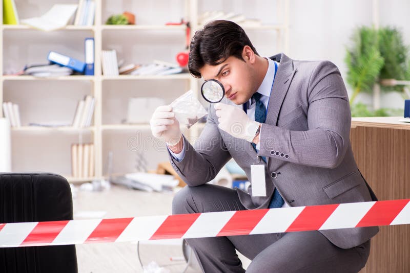 The young man during crime investigation in office