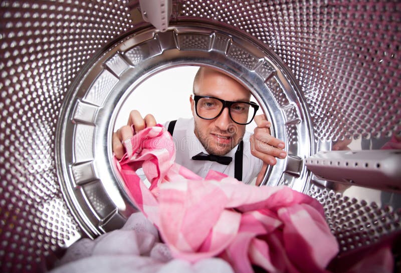 Young man doing laundry stock photo. Image of drum, cleaner 39802592