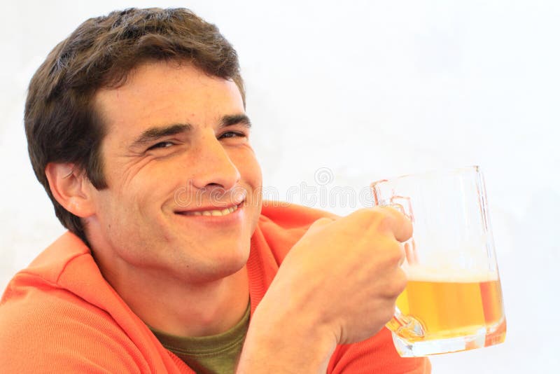 Young man drinking beer stock image. Image of thirsty 39506055