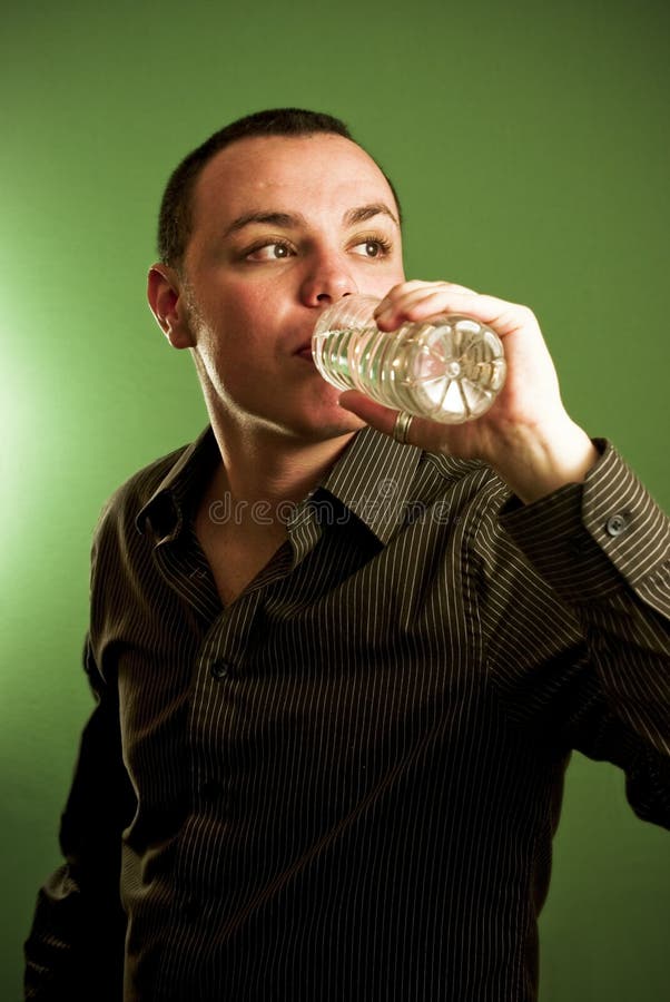 Young man drinking water