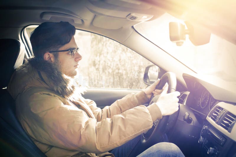 Young man driving stock photo. Image of driver, photogenic 135189328