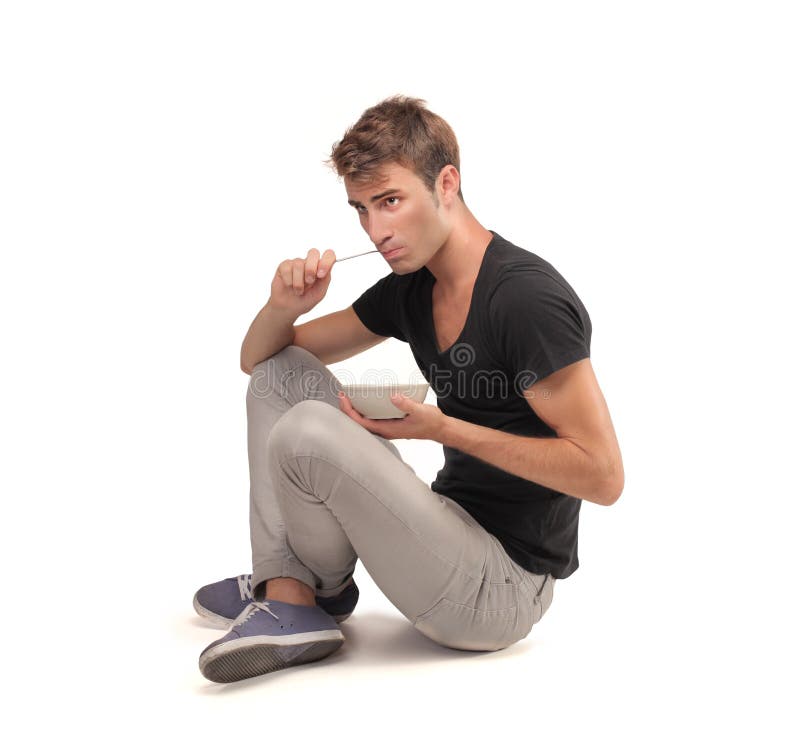 Young Man Eating from a Bowl Stock Photo Image of hunger, rice 32883538