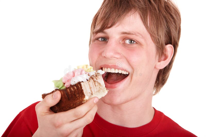 Young Man Eating Chocolate Cake. Stock Image Image of male, isolated