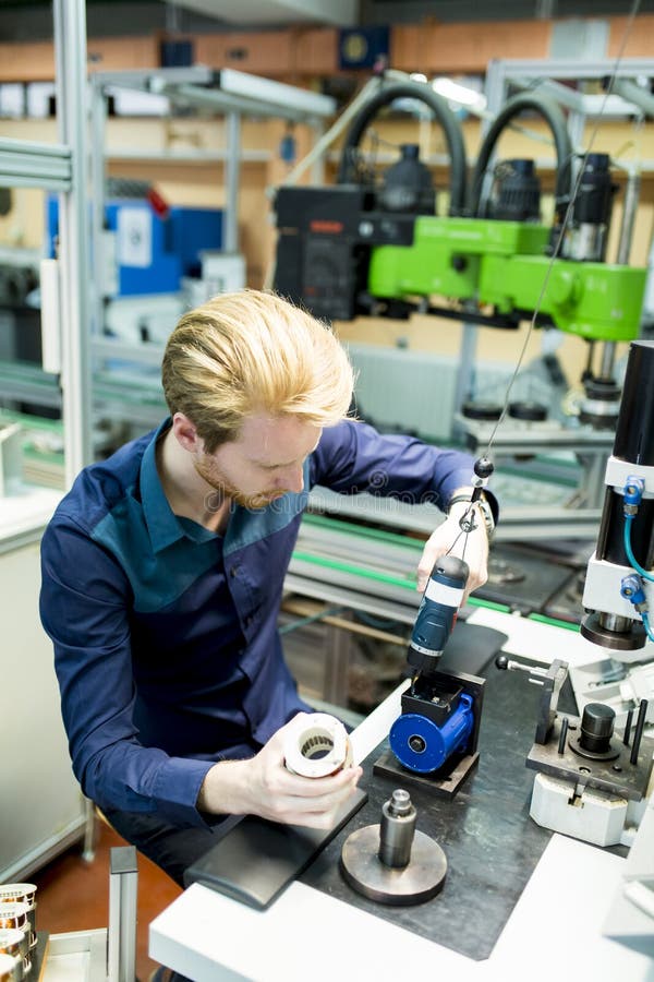 Young Man in Electronics Stock Image Image of equipment