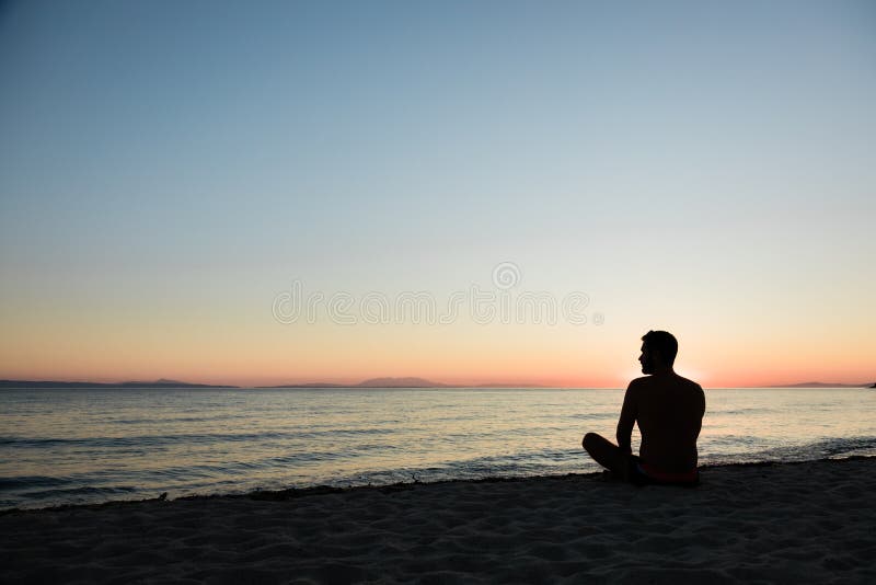 A Person Enjoying The Beach View of the Sunset · Free Stock Photo