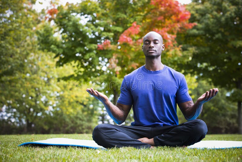 Young man exercising yoga stock image. Image of meditation - 78349421