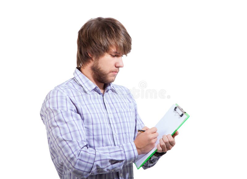 Young man filling out a survey isolated on white. Board survey stock images, royalty-free photos and pictures