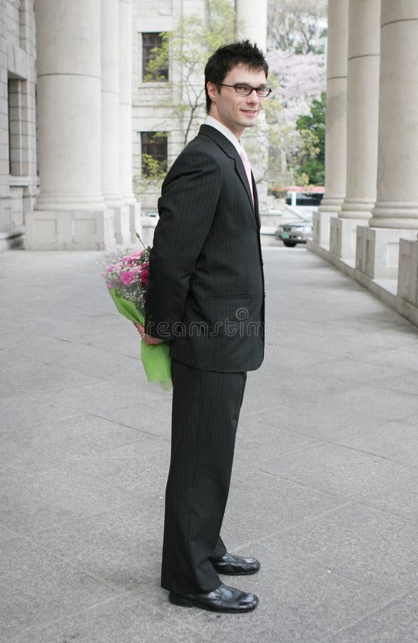 Young man with flowers