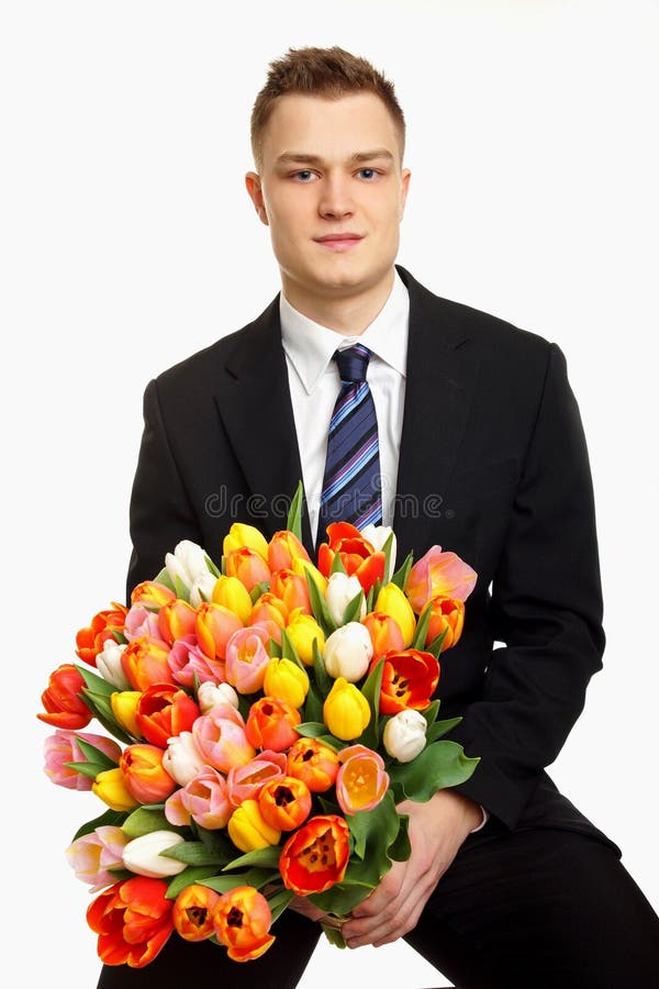 Young man with flowers