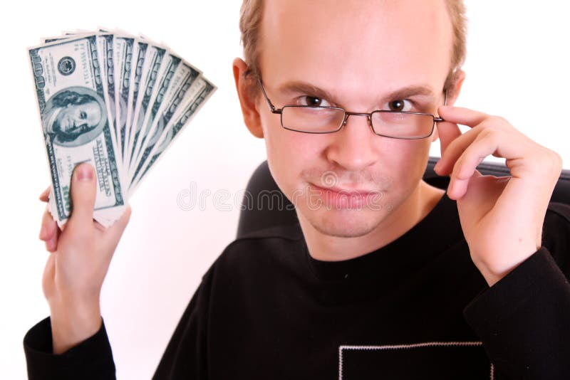 Young man in glasses with dollar banknotes stock photo Young man in glasses with dollar banknotes stock photo