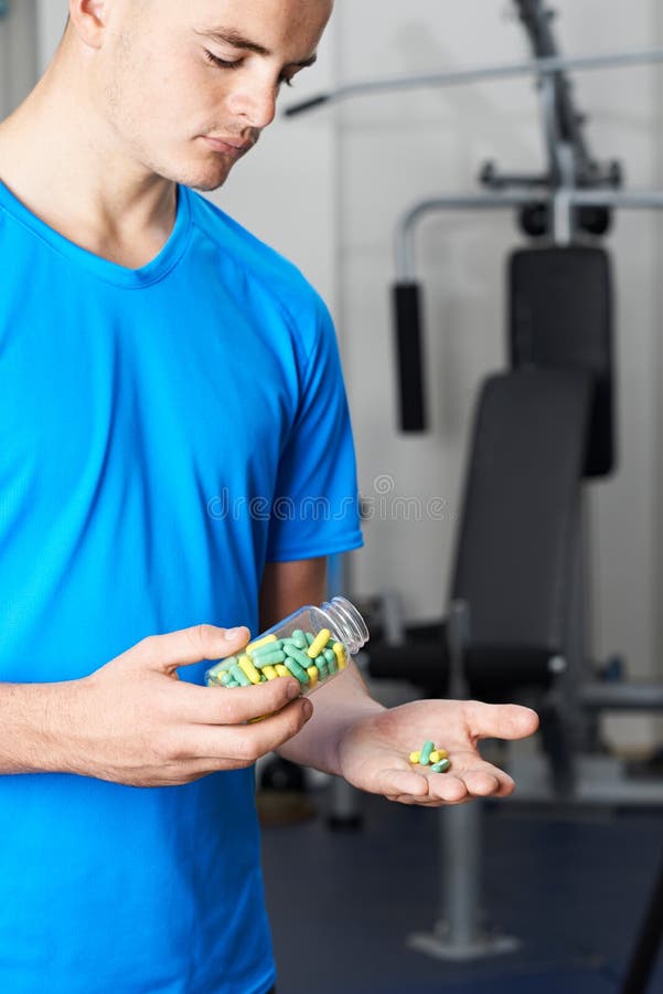 Man Taking Tablets Gym Stock Photos Free & RoyaltyFree Stock Photos
