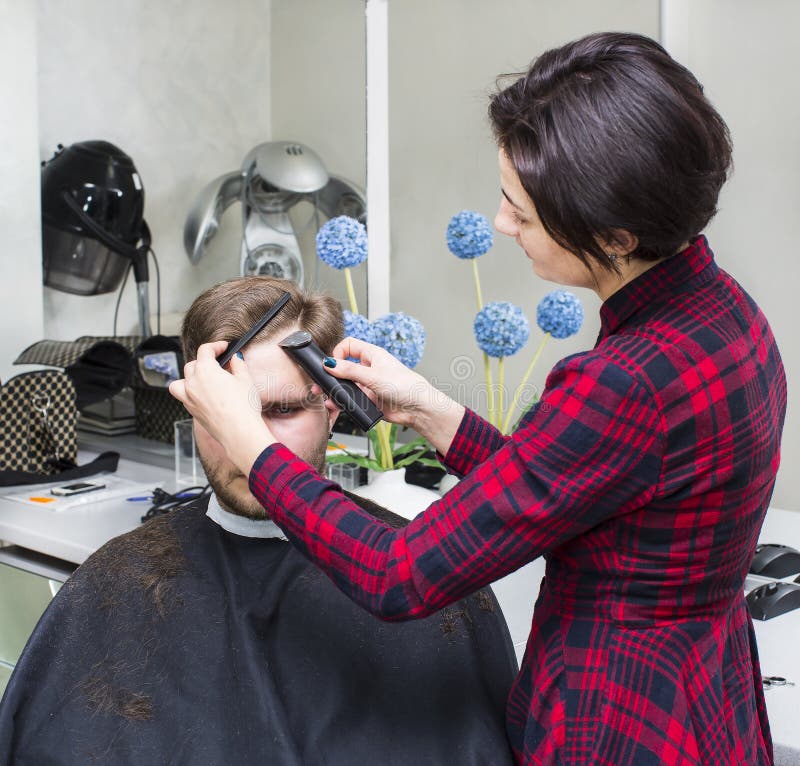 Young man at the hairdresser