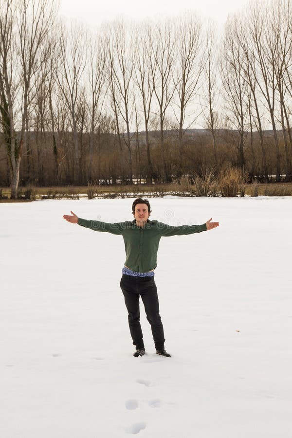 Young Man in Happy Snow stock images Young Man in Happy Snow stock images