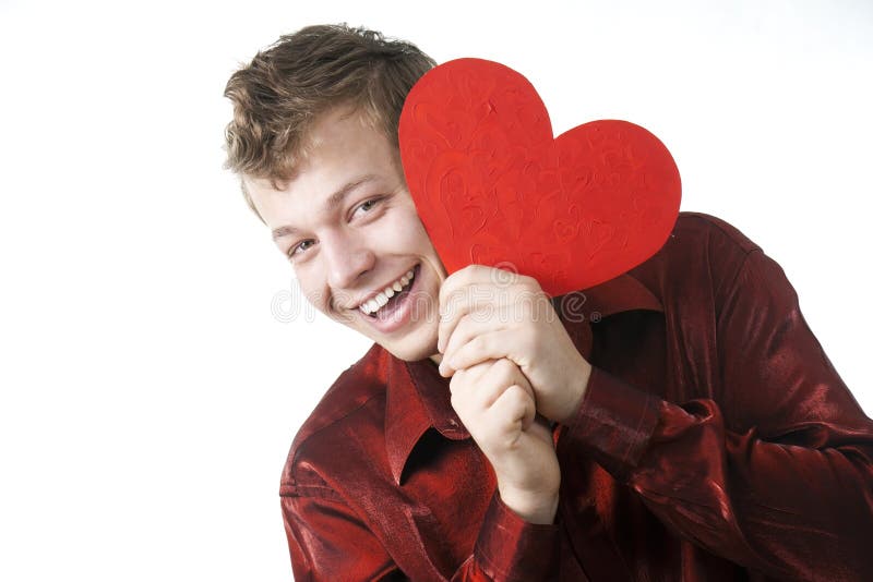 Young man Has hidden for red heart