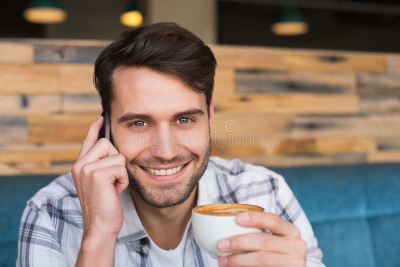 Young Man Having Cup of Coffee Stock Photo Image of phone, industry