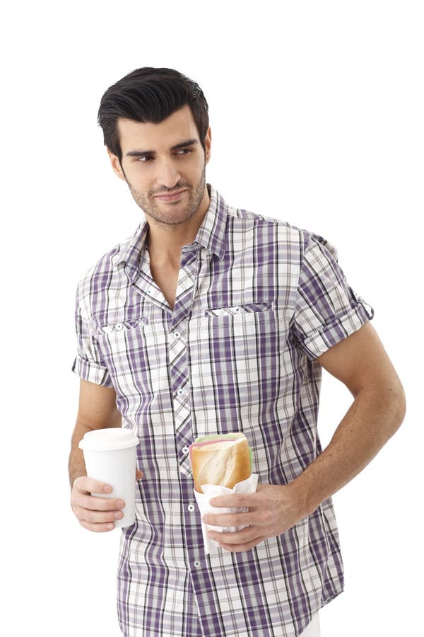 Young man having lunch