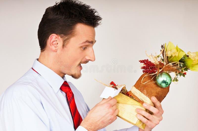 Young man hold Christmas gift