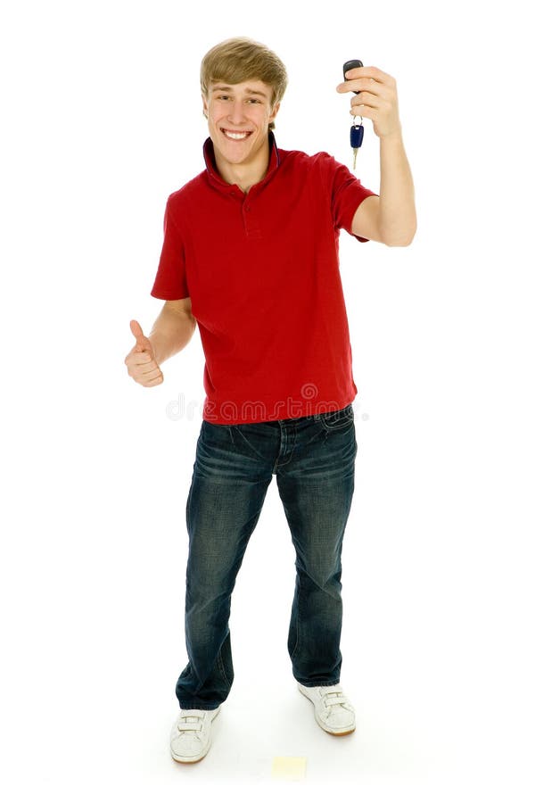 Young man holding car keys, portrait