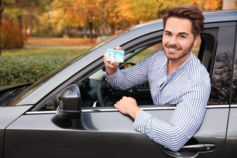 Young Man Holding Driving License Stock Photo Image Of Exam Learn